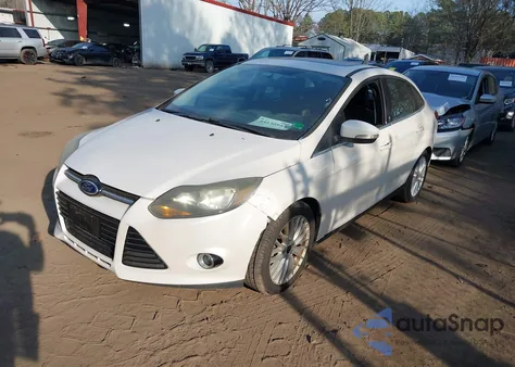 2014 Ford Focus Titanium из США, поврежденный, VIN 1FADP3J21EL367595